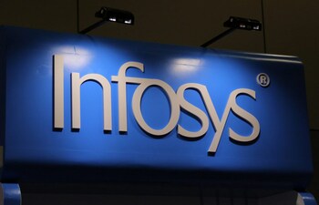 Infosys surges 4% after hiking FY26 revenue view on AI and client gains.