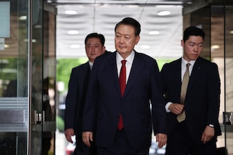 Former South Korean President Yoon Suk Yeol arrives at a court to attend a hearing to review his arrest warrant requested by special prosecutors in Seoul, South Korea. File image/Reuters