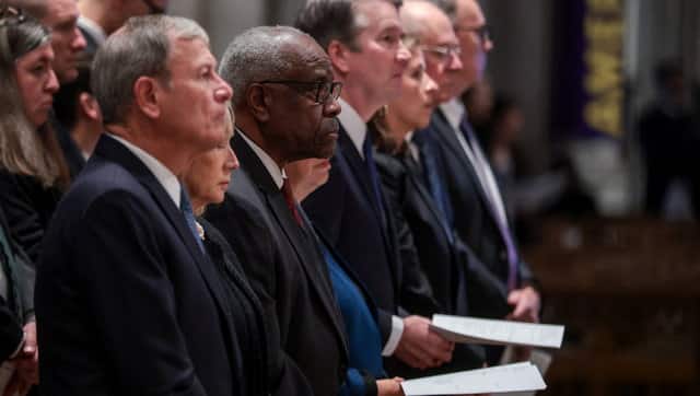 US Supreme Court justices John G Roberts Jr, Clarence Thomas and Brett M Kavanaugh. Reuters