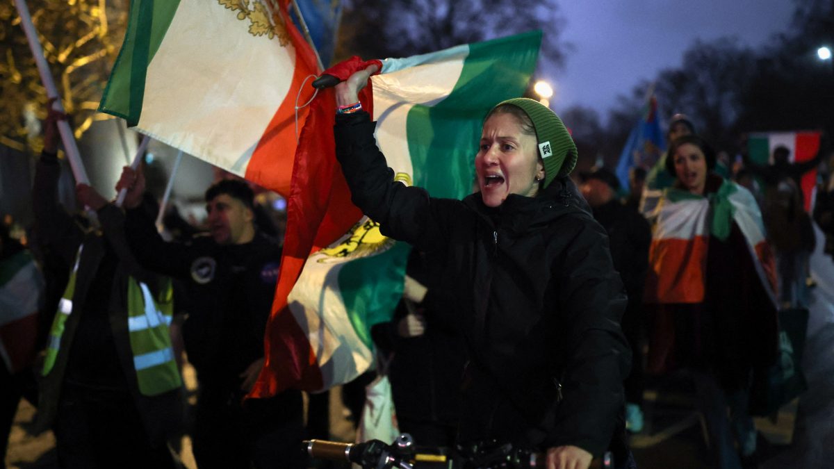 A woman displays the "Lion and Sun" pre-Iranian Revolution national flag as demonstrators walk toward the Iranian embassy during a rally in support of nationwide protests in Iran, in London, Britain, January 11, 2026. REUTERS/Isabel Infantes A woman displays the "Lion and Sun" pre-Iranian Revolution national flag as demonstrators walk toward the Iranian embassy during a rally in support of nationwide protests in Iran, in London, Britain, January 11, 2026. REUTERS/Isabel Infantes