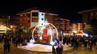 People gather outside Le Constellation bar on Thursday evening. Reuters