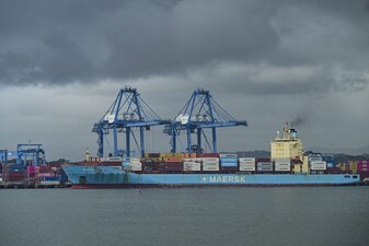 The container ship Maersk Buton from Singapore is seen at the port in Colon, Panama, on December 02, 2025. (Photo by MARTIN BERNETTI / AFP)