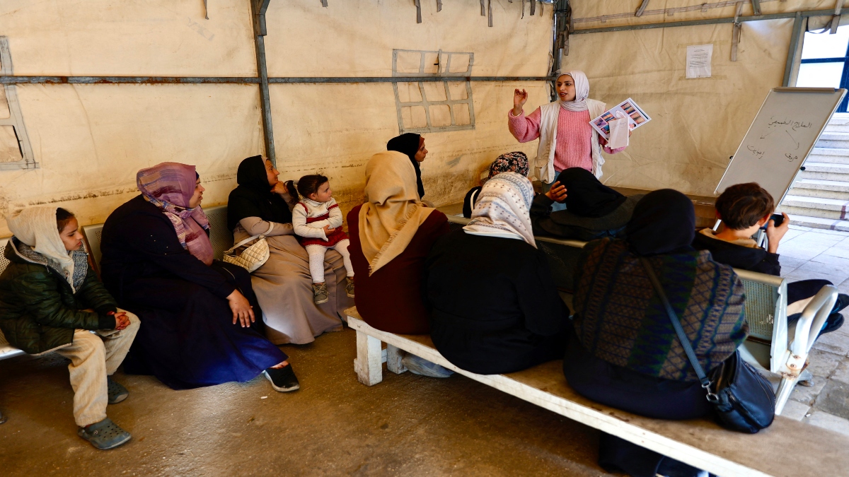 Palestinian women listen to a member of Doctors Without Borders or Medecins Sans Frontieres (MSF) staff as she gives an explanation, at a clinic, in the al-Rimal neighborhood of Gaza City on new year's Eve, December 31, 2025. AFP Palestinian women listen to a member of Doctors Without Borders or Medecins Sans Frontieres (MSF) staff as she gives an explanation, at a clinic, in the al-Rimal neighborhood of Gaza City on new year's Eve, December 31, 2025. AFP