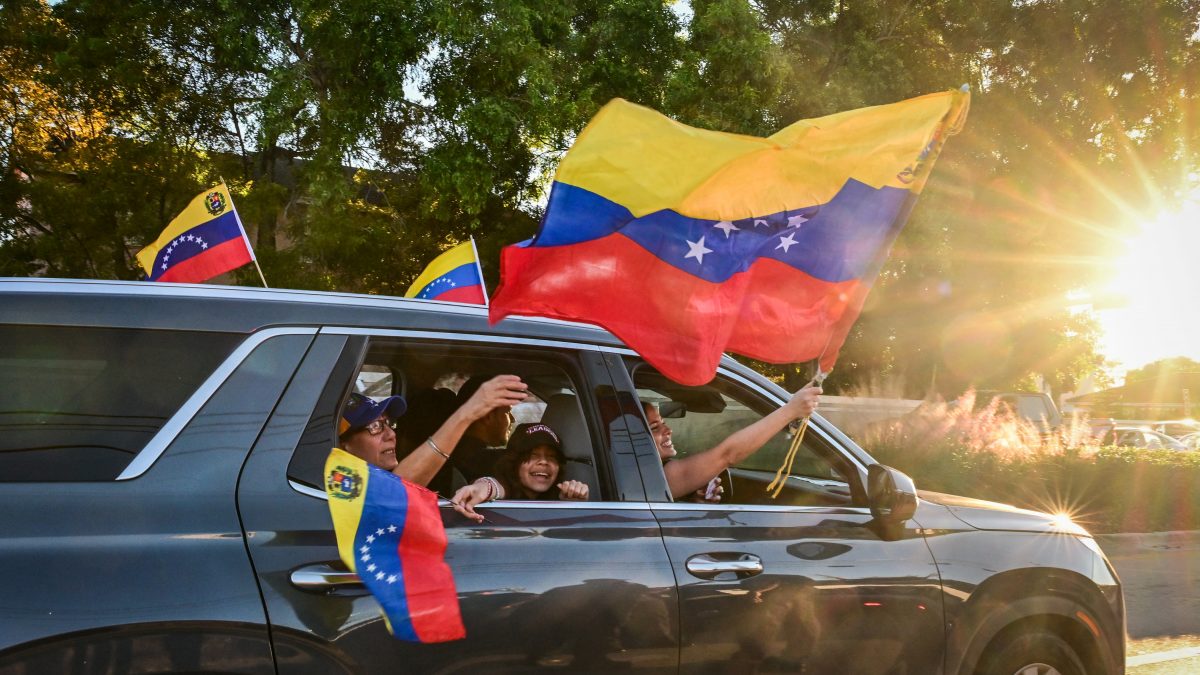 People react to the news of the capture of Venezuelan President Nicolas Maduro, after US military actions in Venezuela this morning, in Doral, Florida, near Miami, on January 3, 2026. (AFP) People react to the news of the capture of Venezuelan President Nicolas Maduro, after US military actions in Venezuela this morning, in Doral, Florida, near Miami, on January 3, 2026. (AFP)