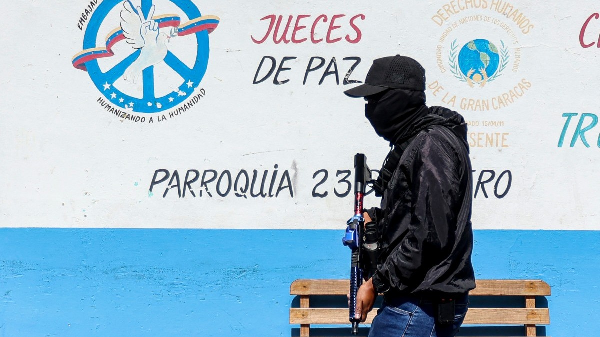 A member of '3 Raices,' a pro-government group known as 'Colectivos,' walks with an assault rifle as he patrols the organization's headquarters in the working-class neighborhood of 23 de Enero, in Caracas on January 7, 2026. AFP A member of '3 Raices,' a pro-government group known as 'Colectivos,' walks with an assault rifle as he patrols the organization's headquarters in the working-class neighborhood of 23 de Enero, in Caracas on January 7, 2026. AFP