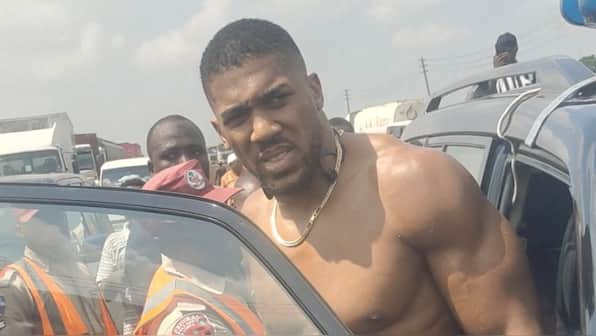 How last-minute change of plan led to British boxing star Anthony Joshua surviving deadly car crash in Nigeria