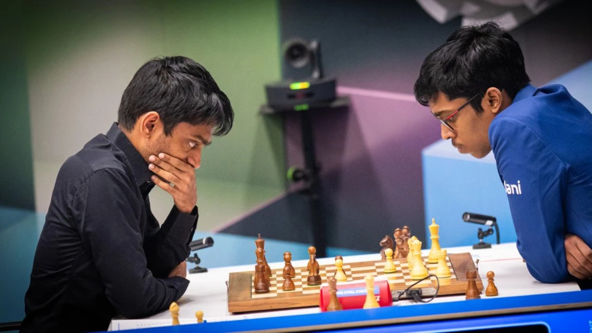 India's Aravindh Chithambaram and R Praggnanandhaa in action during Round 9 of Tata Steel Chess on Tuesday, 27 January. Image credit: Lennart Ootes/Tata Steel Chess India's Aravindh Chithambaram and R Praggnanandhaa in action during Round 9 of Tata Steel Chess on Tuesday, 27 January. Image credit: Lennart Ootes/Tata Steel Chess