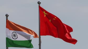 National flags of China and India fly next to the Meijiang Convention and Exhibition Center, a venue for 2025 Shanghai Cooperation Organisation (SCO) summit in Tianjin, China on August 30, 2025. Reuters File