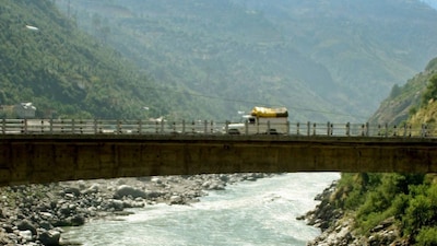 A vehicle crosses a bridge over the river Chenab at Doda district, about 200 km (124 miles) northwest from the northern Indian city of Jammu, October 3, 2005. Representational Image/Reuters