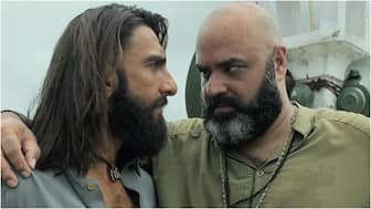 Naveen Kaushik with Ranveer Singh in a still from Dhurandhar.