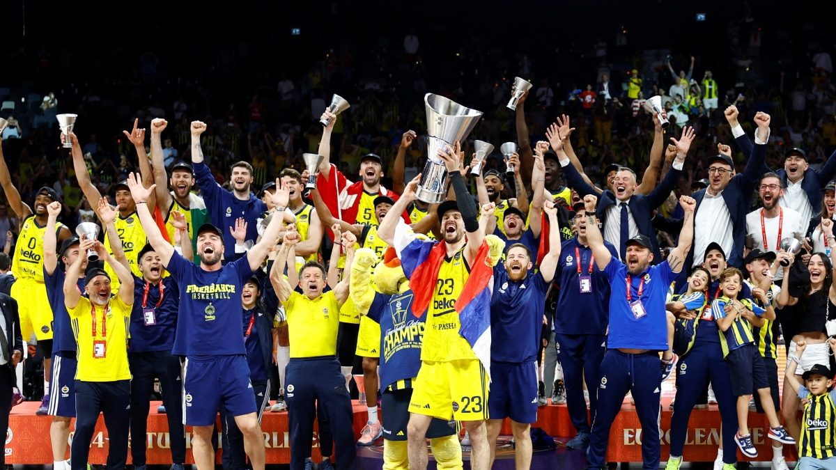 May 25, 2025 Fenerbahce's Marko Guduric celebrates with the trophy and teammates after winning the EuroLeague. Reuters May 25, 2025 Fenerbahce's Marko Guduric celebrates with the trophy and teammates after winning the EuroLeague. Reuters