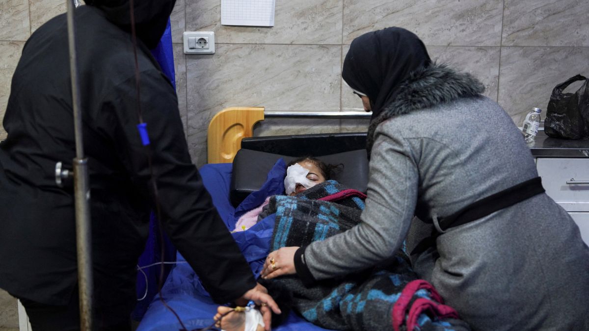 A mother sits beside her daughter who was injured during clashes between the Syrian army and the Syrian Democratic Forces (SDF) as a nurse takes care of her at a hospital in Aleppo, Syria, on January 6, 2026. (Photo: Karam al-Masri/Reuters) A mother sits beside her daughter who was injured during clashes between the Syrian army and the Syrian Democratic Forces (SDF) as a nurse takes care of her at a hospital in Aleppo, Syria, on January 6, 2026. (Photo: Karam al-Masri/Reuters)
