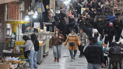 People walk in Tehran Grand Bazaar in Tehran, Iran, on January 15, 2026. Reuters