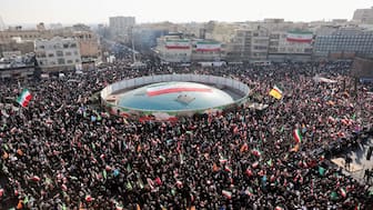 Iranians attend a pro-government rally in Tehran, Iran, on Monday. Reuters

