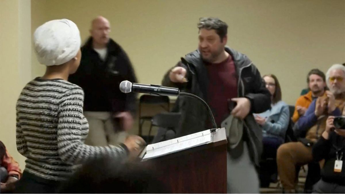A man shouts at US Representative Ilhan Omar (D-MN) after spraying her, during a town hall meeting days after a man identified as Alex Pretti was fatally shot by federal immigration agents trying to detain him, in Minneapolis, Minnesota, US, January 27, 2026, in a still image from video. File Image/Reuters A man shouts at US Representative Ilhan Omar (D-MN) after spraying her, during a town hall meeting days after a man identified as Alex Pretti was fatally shot by federal immigration agents trying to detain him, in Minneapolis, Minnesota, US, January 27, 2026, in a still image from video. File Image/Reuters