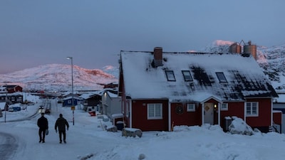 People walk along a street next to the US Consulate in Nuuk, Greenland, January 21, 2026. File Image/Reuters
