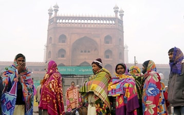 The India Meteorological Department (IMD) has predicted cold to severe cold conditions in several pockets of northwest India for the next five days. People wrap themselves in blankets as cold weather conditions prevail near Jama Masjid in New Delhi. PTI