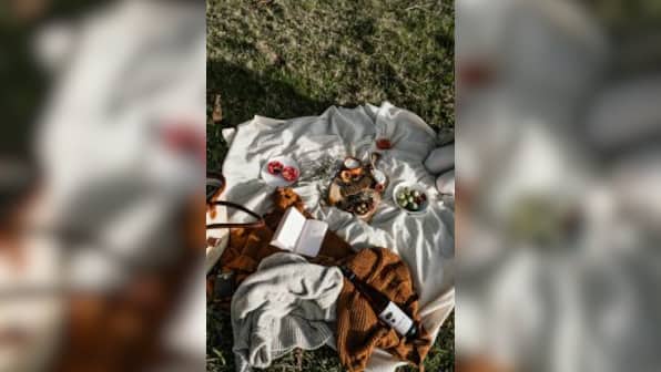 A feast on a picnic blanket.