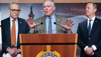 US Senator Tim Kaine (C), Democrat of Virginia, speaks alongside US Senate Minority Leader Chuck Schumer (L), Democrat of New York, and US Senator Adam Schiff (R), Democrat of California, during a press conference after a US Senate vote on a War Powers Resolution blocking further US military action in Venezuela at the US Capitol in Washington, DC, January 8, 2026.- AFP