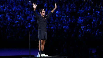 Roger Federer acknowledges the crowd at the Rod Laver Arena during the opening ceremony of the 2026 Australian Open on Saturday, 17 January. Reuters