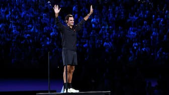 Roger Federer acknowledges the crowd at the Rod Laver Arena during the opening ceremony of the 2026 Australian Open on Saturday, 17 January. Reuters