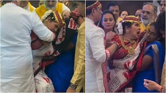 WATCH! Sudha Chandran overwhelmed with emotion during bhajan, tries to bite as devotees hold her back