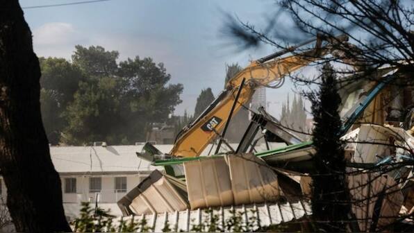 Israel bulldozes UNRWA headquarters in east Jerusalem after banning agency’s operations