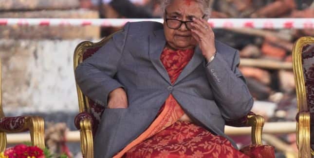 Nepal’s Prime Minister Sushila Karki waits as ministers prepare to take the oath of office administered by Nepali President Ram Chandra Poudel at the presidential building in Kathmandu, Nepal, on Sept. 15, 2025