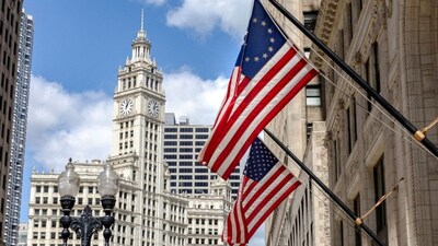 American flags hang outside of a building on Michigan Avenue as US President Donald Trump said on Monday that the US military might deploy to Chicago, Illinois, US, August 25, 2025.  File Photo/Reuters
