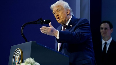 Photos show a purple blemish as Donald Trump spoke at the 'Board of Peace' event, which was held in Davos, Switzerland. Image courtesy: @GeopolitixM/X

