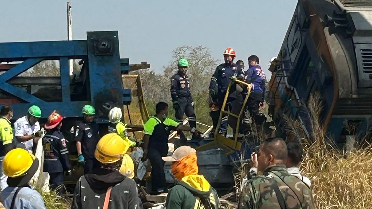 Rescue workers next to the wreckage of a train crash after a construction crane collapse in Thailand's Nakhon Ratchasima province. Image Credit: AFP Rescue workers next to the wreckage of a train crash after a construction crane collapse in Thailand's Nakhon Ratchasima province. Image Credit: AFP