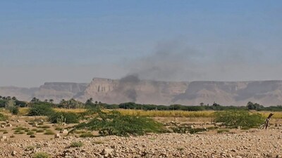 This image grab from an AFPTV footage shows Smoke billowing after airstrikes that killed seven people in Yemen as a Saudi-led coalition hit back against a sweeping advance by the UAE-backed Southern Transition Council (STC) that threatens to spiral into a major confrontation. AFP