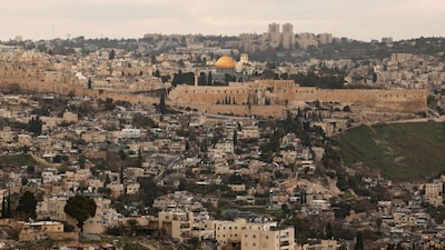 This picture taken from the Jabal Mukaber neighbourhood of Israeli-annexed east Jerusalem shows a view of east Jerusalem and the compound of the Al-Aqsa mosque and its Dome of the Rock in the Old City of Jerusalem on January 2, 2026. (Photo by Ahmad GHARABLI / AFP)

