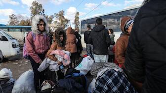 Kurds fleeing a government advance through Kurdish-controlled areas arrive in the Kurdish Syrian city of Qamishli on January 19, 2026.
 (AFP)