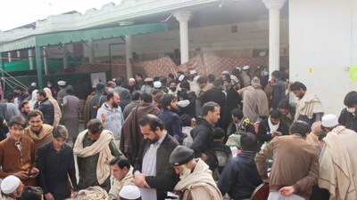 Residents from Tirah valley, who fled a remote mountainous region bordering Afghanistan, gather to get themself registered, in Bara, Khyber District of Khyber Pakhtunkhwa province. (Reuters)