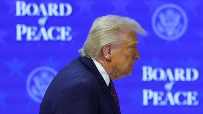 Donald Trump walks after charter announcement for his 'Board of Peace' initiative aimed at resolving global conflicts, alongside the 56th annual World Economic Forum (WEF), in Davos, Switzerland, January 22. Reuters