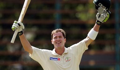 File Photo: Australia's Damien Martyn celebrates his century against South Africa on day five of the third and final cricket test match in Johannesburg, South Africa April 4, 2006. Reuters