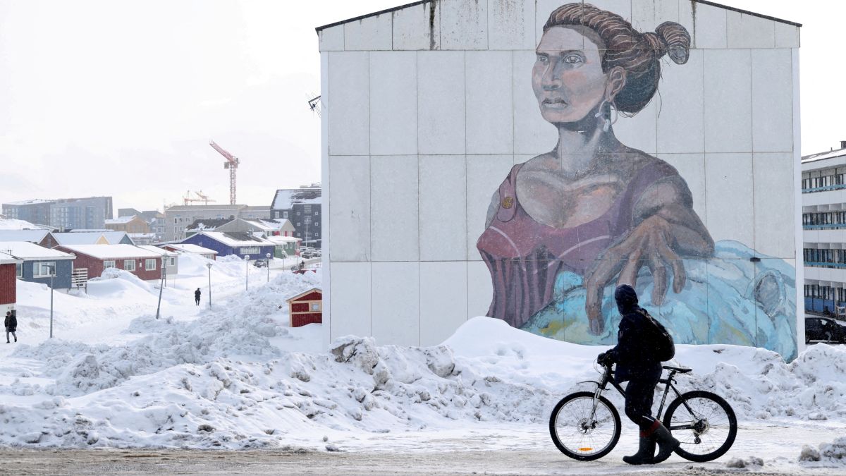 A man passes a building with social housing with an Inuit mural in Nuuk, Greenland. Donald Trump on Friday again suggested the use of force to seize Greenland as he brushed aside Denmark's sovereignty over the autonomous Arctic island. File photo/Reuters A man passes a building with social housing with an Inuit mural in Nuuk, Greenland. Donald Trump on Friday again suggested the use of force to seize Greenland as he brushed aside Denmark's sovereignty over the autonomous Arctic island. File photo/Reuters