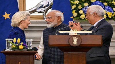 European Commission President Ursula von der Leyen shakes hands with Prime Minister Narendra Modi as European Council President Antonio Costa watches during joint press statements after their meeting in New Delhi. India and the European Union announced the "mother of all deals", a huge trade pact to create a market of two billion people, reached after two decades of negotiations. AFP