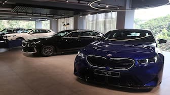 Cars are displayed inside a BMW showroom in Mumbai. (File image/Reuters)