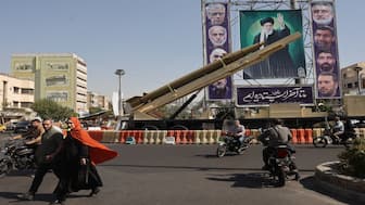 An Iranian missile system is displayed next to a banner with a picture of Iran's Supreme Leader Ayatollah Ali Khamenei in a street in Tehran, Iran. The Islamic Republic has a powerful military with Global Firepower stating that it is a Top 20 global military power. File image/Reuters