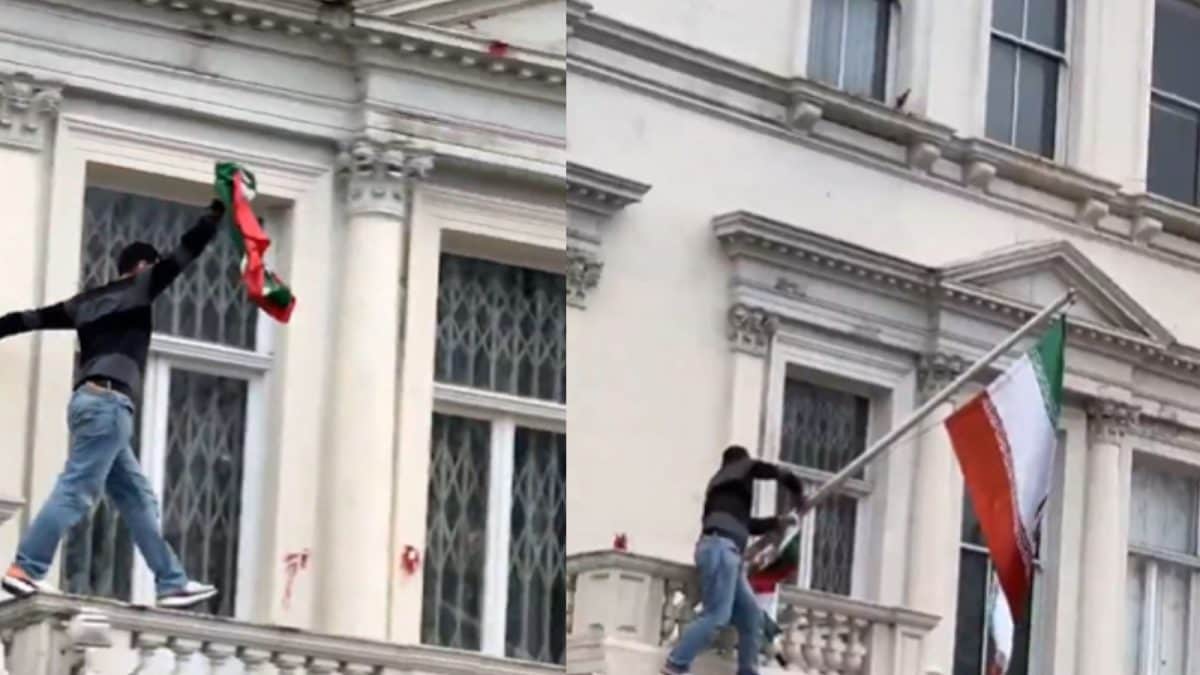 Protester replaces Iranian regime flag, climbs embassy balcony in London | Watch Protester replaces Iranian regime flag, climbs embassy balcony in London | Watch