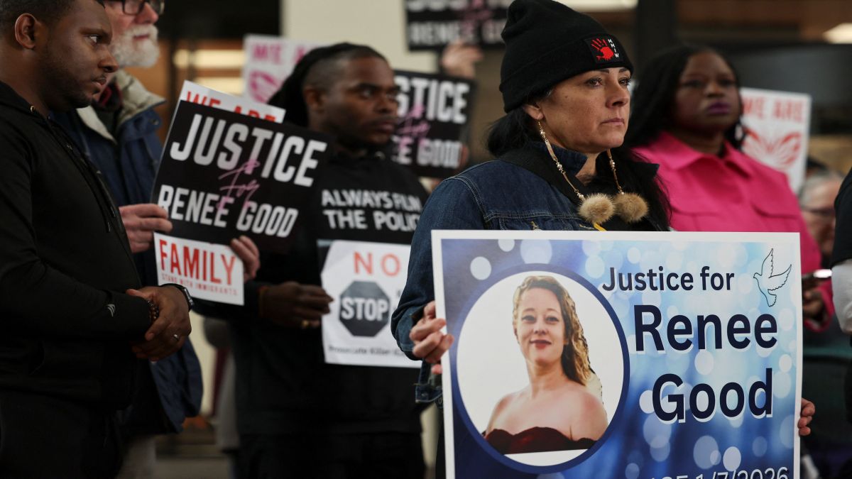 Attendees hold signs during a press conference, following the fatal shooting of Renee Nicole Good by a US Immigration and Customs Enforcement (ICE) agent, in Minneapolis, Minnesota. Reuters Attendees hold signs during a press conference, following the fatal shooting of Renee Nicole Good by a US Immigration and Customs Enforcement (ICE) agent, in Minneapolis, Minnesota. Reuters