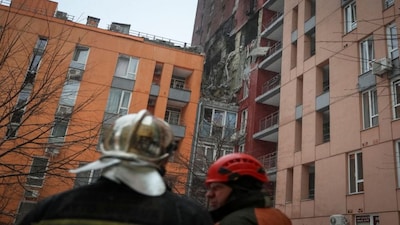 Rescuers work at the site of the apartment building hit by a Russian drone strike, amid Russia's attack on Ukraine, in Kyiv, Ukraine. Reuters