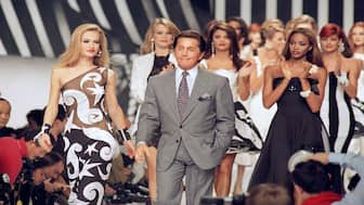 Italian fashion designer Valentino Garavani walks the catwalk with his models after a fashion show in 1991 in Paris, France. At the age of 93, the designer passed away, leaving a $1.5-billion fortune behind. File image/AP