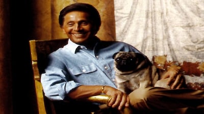 Italian designer Valentino in Tuscany with one of his six beloved pugs. Image Courtesy: @realmrvalentino/Instagram