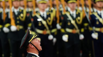 A Chinese People's Liberation Army (PLA) honour guard shouts during a welcoming ceremony at the Great Hall of the People in Beijing, China November 25, 2025. File Photo/Reuters