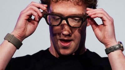 Meta CEO Mark Zuckerberg wears the Meta Ray-Ban Display glasses, as he delivers a speech presenting the new line of smart glasses, during the Meta Connect event at the company's headquarters in Menlo Park, California, U.S., September 17, 2025. File Photo/Reuters