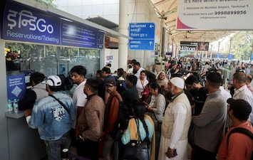 Passengers wait outside the IndiGo airlines ticketing counter at the Chhatrapati Shivaji Maharaj International Airport after several IndiGo airlines flights were cancelled in Mumbai, India. Following this episode, the country's aviation regulator has introduced changes in flight refund norms. File image/Reuters