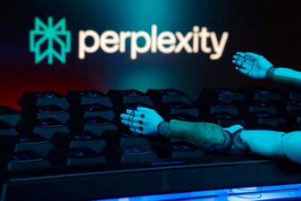 FILE PHOTO: The perplexity logo, a keyboard, and robot hands are seen in this illustration taken January 27, 2025. REUTERS/Dado Ruvic/Illustration/File Photo